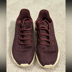 burgundy Adidas tennis shoes